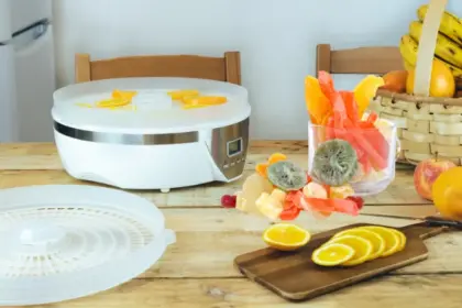 Image of food dehydrator so you can dehydrate fruit and veggies you buy on sale, in bulk and save money while lower food waste.