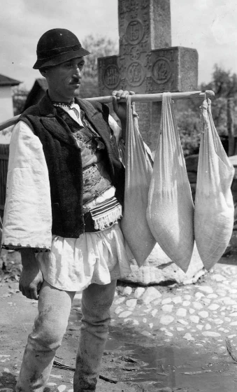 1938 - A cheese salesman sells his wares in Romania. Source: Three Lions