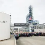 Photo of LanzaJet's newly opened sustainable jet fuel plant in Georgia showing large fuel holding tank.