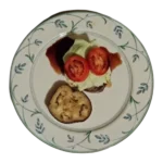 Photo on transparent background of a cooked kangaroo burger patty on a roasted slice of eggplant with cabbage leaves and tomato slices.